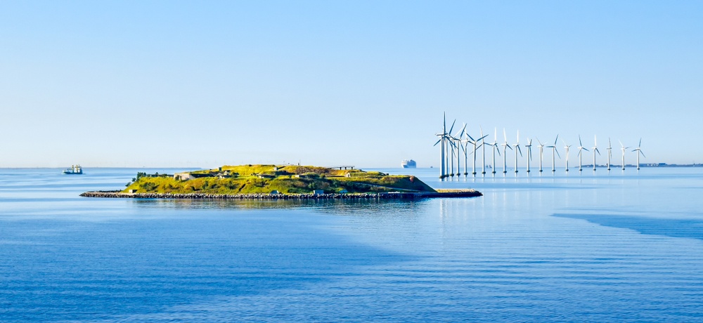 Island Middelgrundsfortet and offshore wind turbines on the coast of Copenhagen in Denmark 