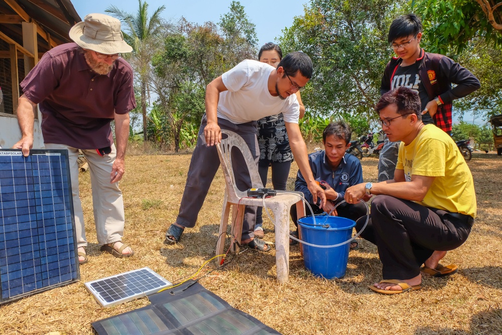 Tachileik, Myanmar. Using solar panels to provide power for water pump in remote area of Myanmar 