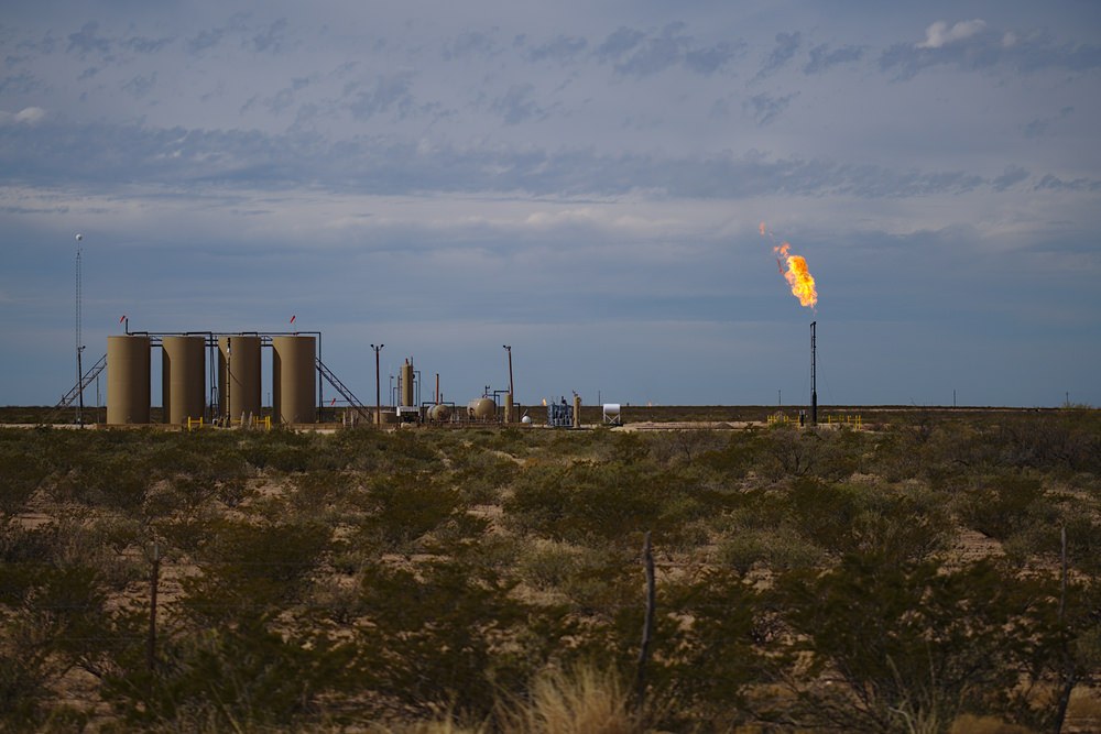 natural gas flare stack in rural area 