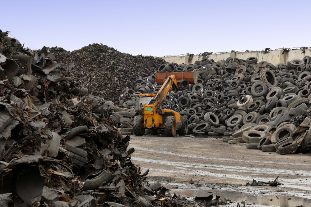 old tires being shredded to be recycled for energy 