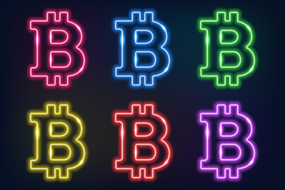 various colors of neon glowing bitcoin logo outline 