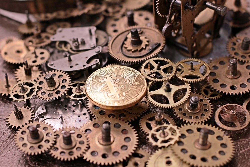 bitcoin fit inside vintage clock internal gears and sprockets. bitcoin time machine regret 