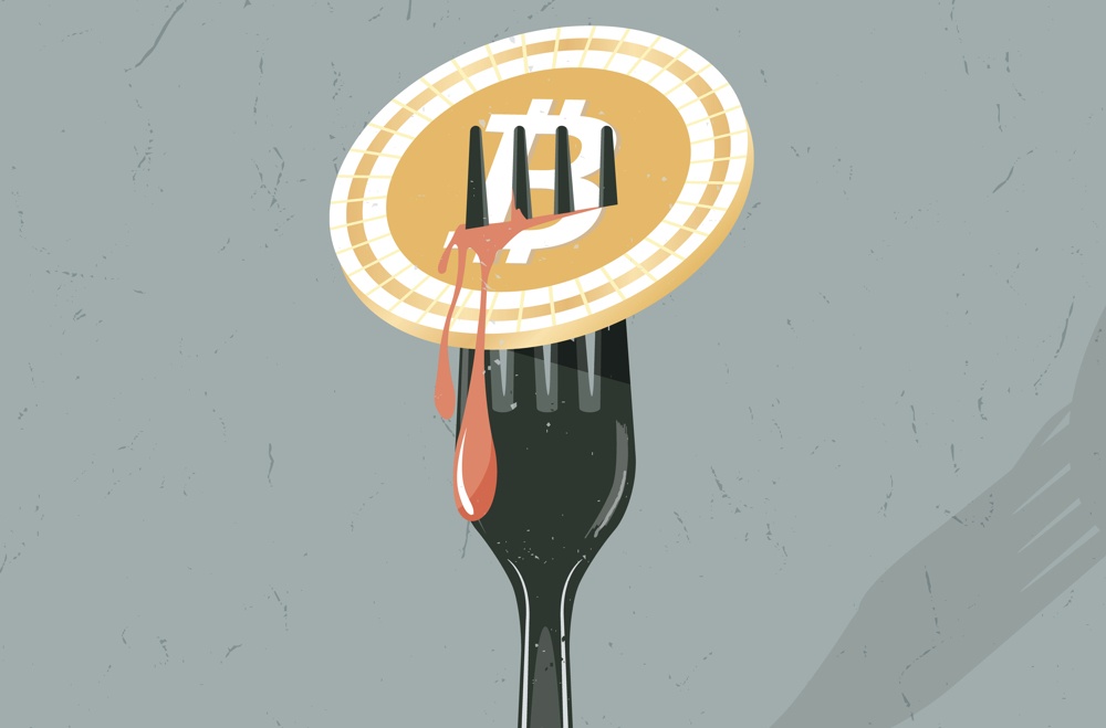 bitcoin hard fork concept with fork sticking into bleeding bitcoin 