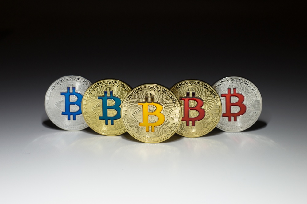 what 's the next bitcoin? silver and gold bitcoin with various color logos. new bitcoin