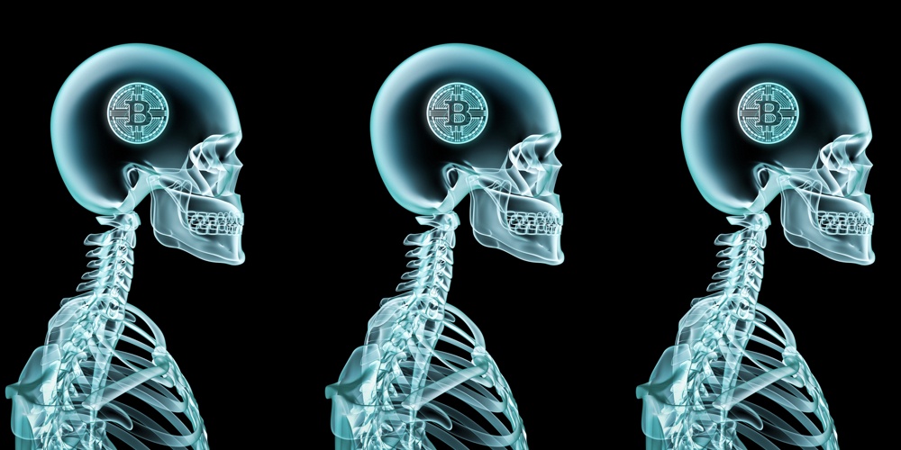 x-ray-skeleton-in-blue-with-bitcoin-inside-skull 