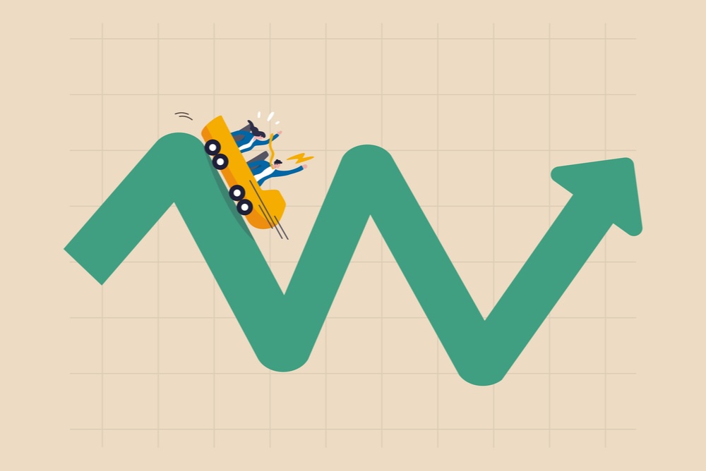 market changes in bitcoin buy and sell. man and woman riding roller coaster on market chart 