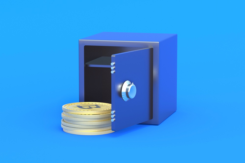 where is bitcoin stored? Metal safe with blue hue on blue background with bitcoins stored inside 