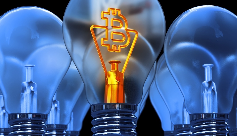 golden bitcoin filament in lightbulb 