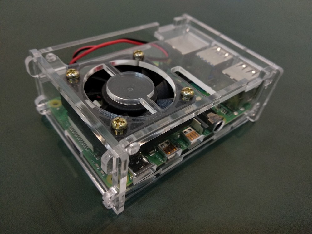 raspberry pi computer running bitcoin software with a fan an internet connection 