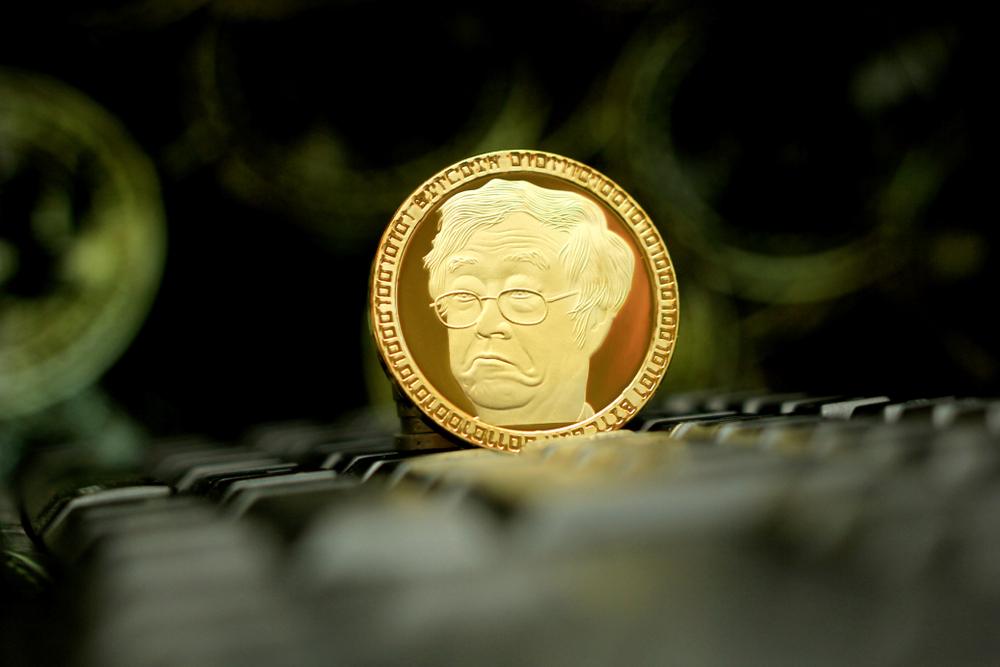 dorian nakamoto face on gold coin. comedic representation of a satoshi, one hundred millionth of a bitcoin 