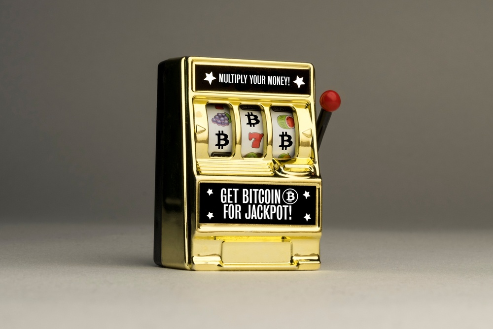 slot machine with bitcoin symbols. someone gets lucky by owning bitcoin. early bitcoiners didn 't get lucky, they were smart.