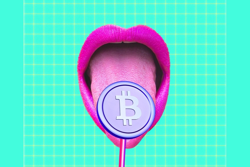 neon lips and tongue eating lollipop with bitcoin logo 