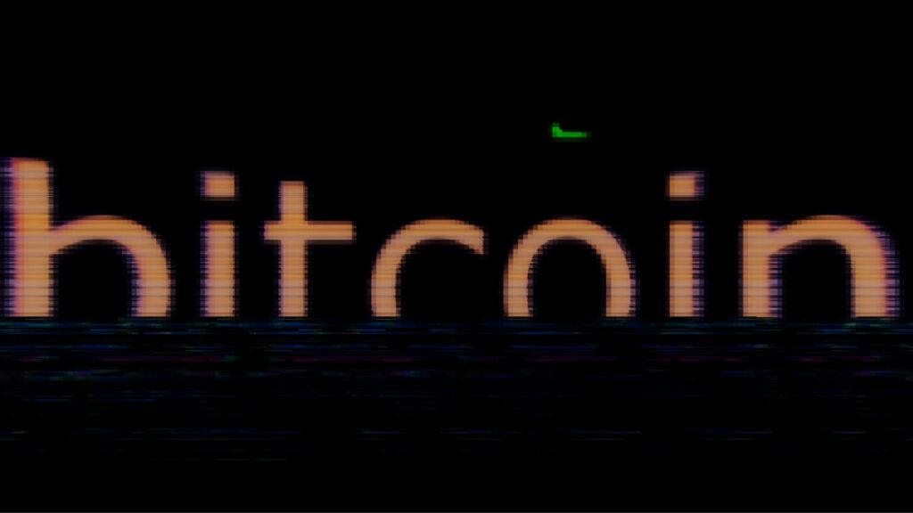 glitched bitcoin word coming through static tv signal 