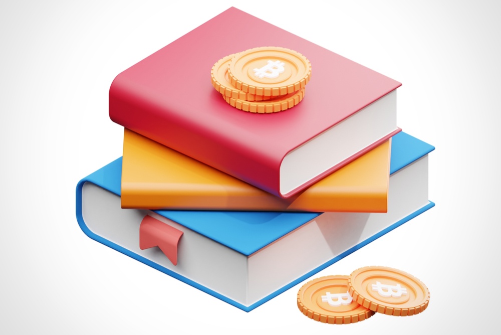 An illustration of three books with physical bitcoins on the side and the top 