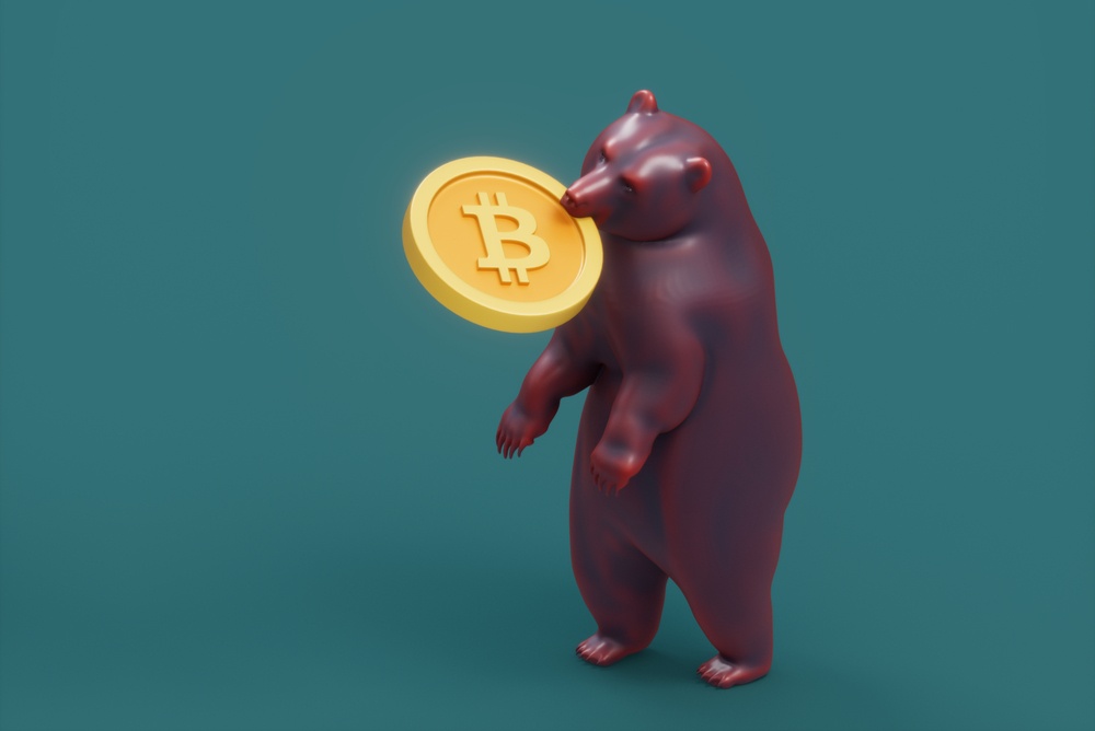 large red bear holding a bitcoin in its mouth. bitcoin in a bear market 