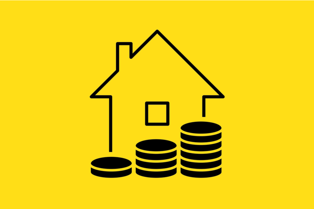 outline of house (real estate) with coins stacking up in front. yellow and black design 