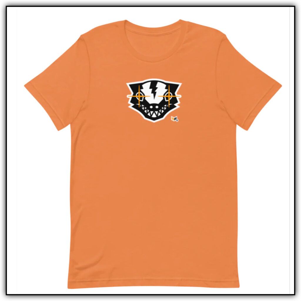 An orange t-shirt with a badger head and lasers shooting out of his eyes. 