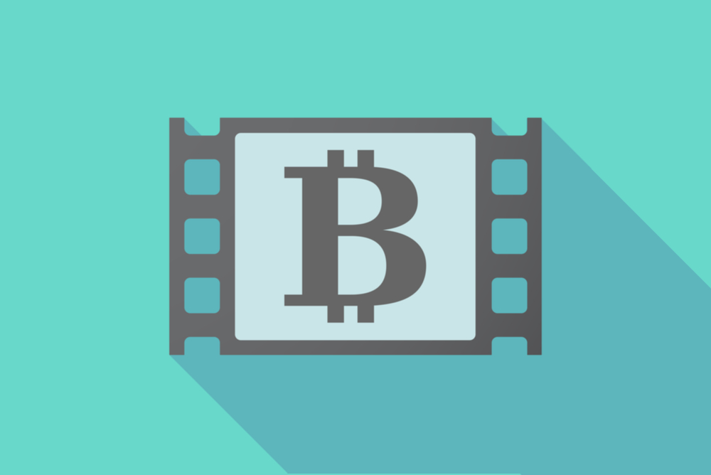 vector graphic of classic film strip with the bitcoin logo on green background 