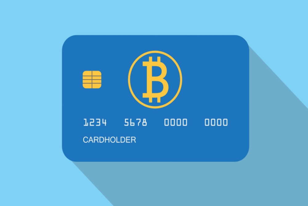 buy gift cards with bitcoin. blue gift card with golden bitcoin logo and card number 