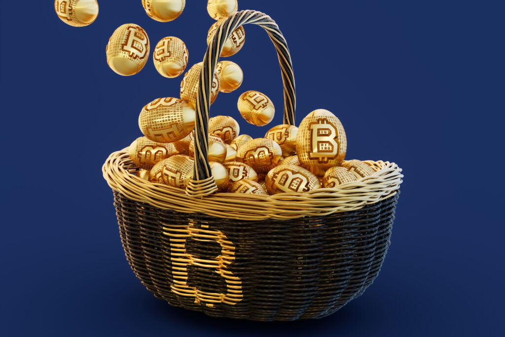 golden eggs with bitcoin logo in easter basket. bitcoin nest egg 