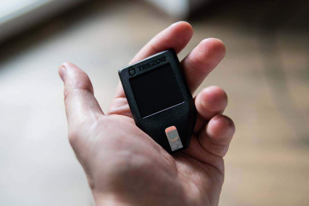 Trezor Model T in hand 