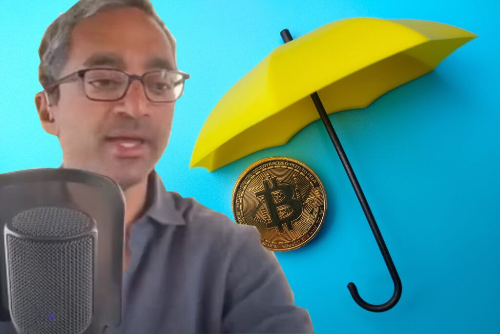 Chamath Palihapitiya with a bitcoin and umbrella. bitcoin is schmuck insurance.  